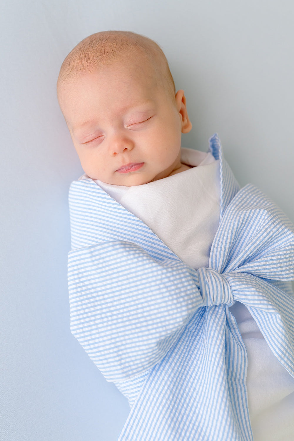 Beaufort Bonnet Bow Swaddle ® - Breakers Blue Seersucker